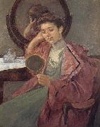 Lady in front of the dressing table